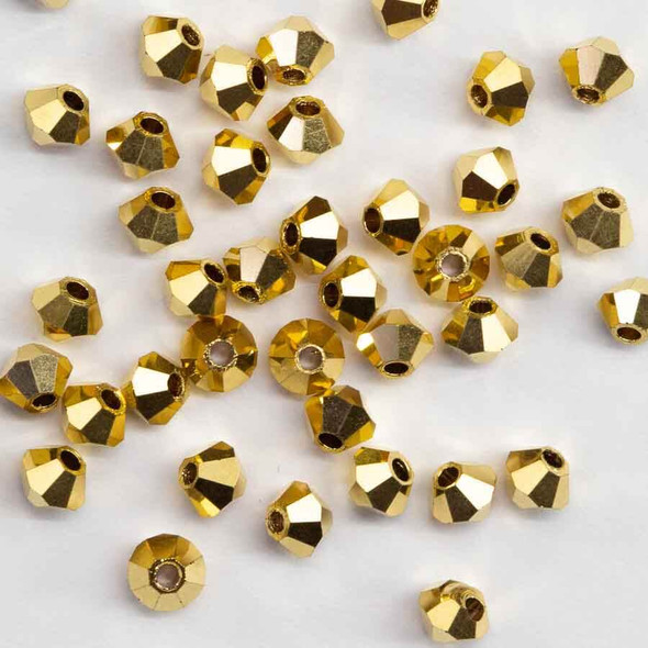 CRYSTAL AURUM 3mm Preciosa Crystal Bicone Beads